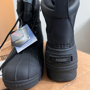 Khombu men’s snow boots size 10. New with tags.